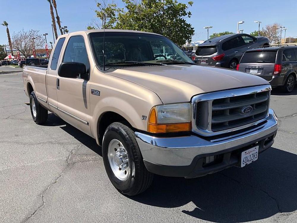 1999 GOLD /GRAY Ford F250 SD 2WD (1FTNX20S8XE) with an 10-Cyl 6.8 Liter engine, Automatic transmission, located at 412 Auto Vista Drive, Palmdale, 93551, (661) 945-0620, 34.592636, -118.136681 - Photo #0