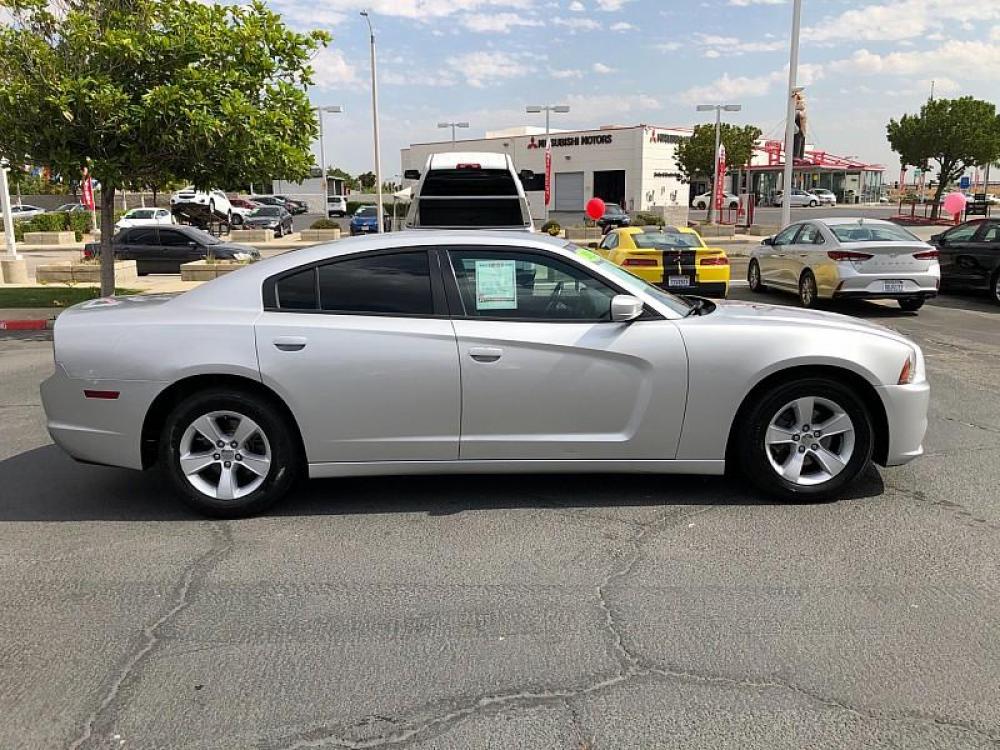 2012 SILVER Dodge Charger (2C3CDXHG7CH) with an V6 3.6 Liter engine, Automatic 8-Spd transmission, located at 412 Auto Vista Drive, Palmdale, 93551, (661) 945-0620, 34.592636, -118.136681 - Photo #1