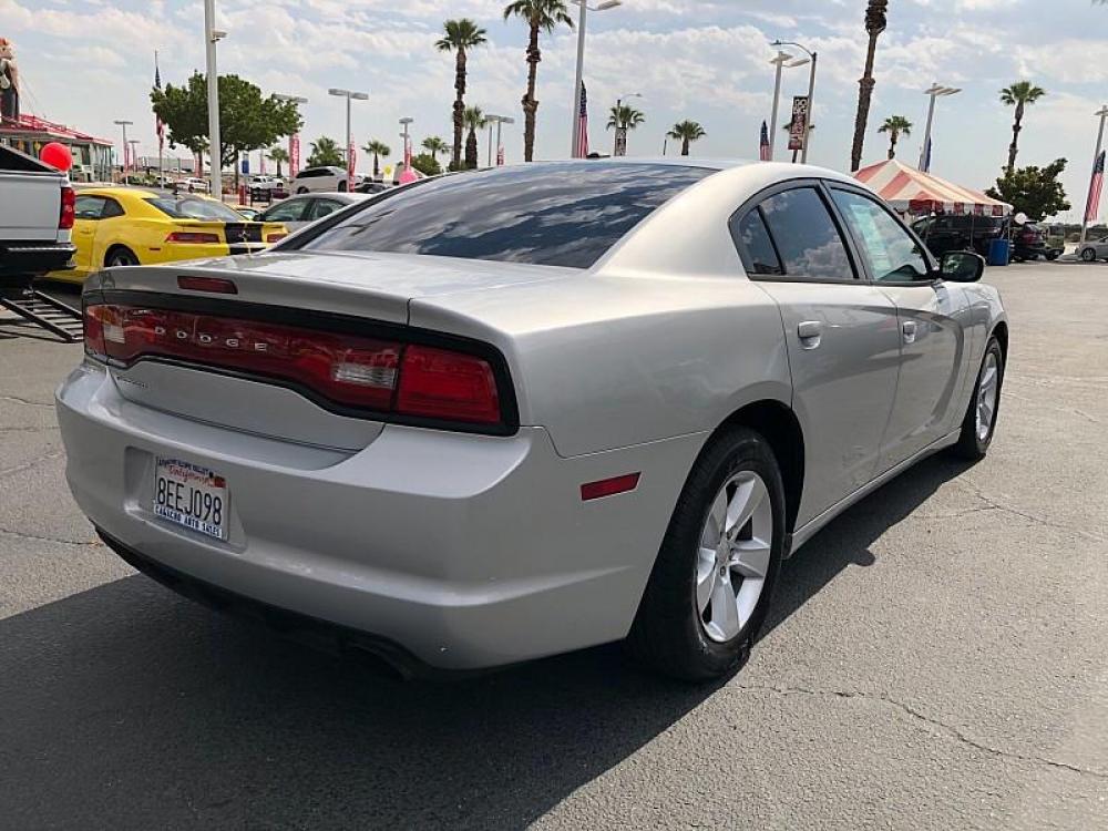 2012 SILVER Dodge Charger (2C3CDXHG7CH) with an V6 3.6 Liter engine, Automatic 8-Spd transmission, located at 412 Auto Vista Drive, Palmdale, 93551, (661) 945-0620, 34.592636, -118.136681 - Photo #2
