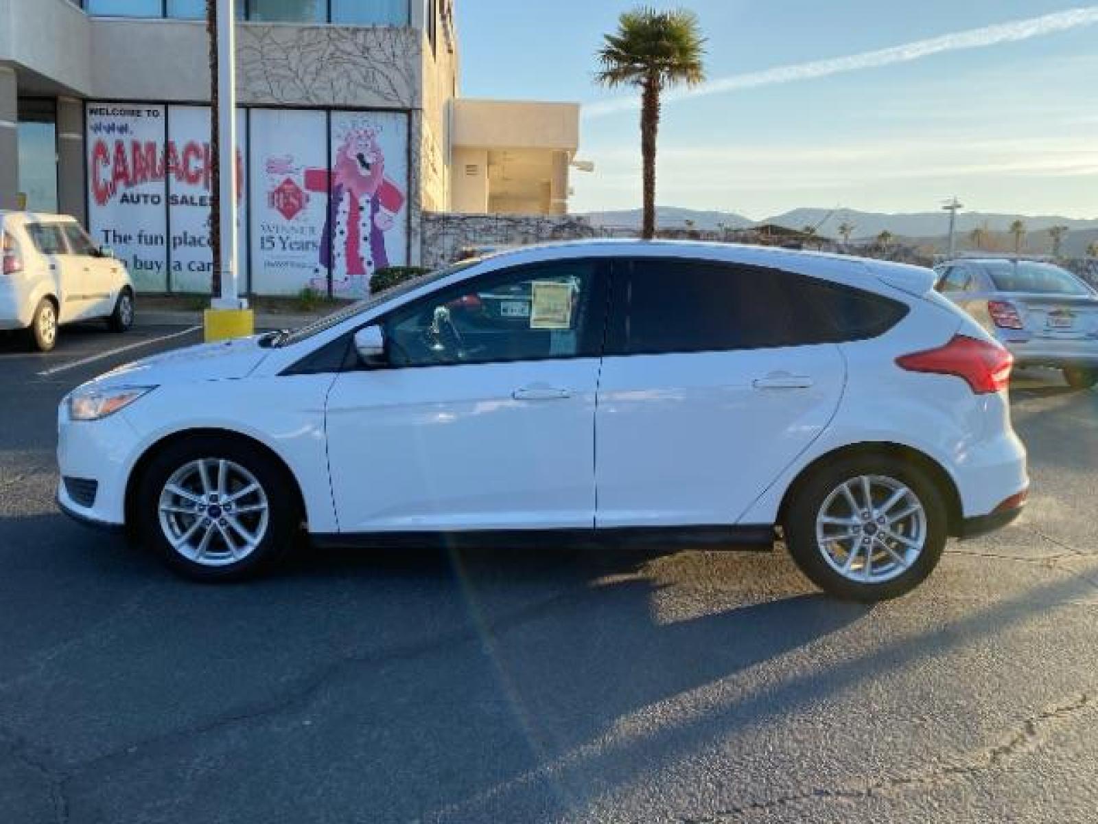 2016 WHITE Ford Focus (1FADP3K25GL) with an 4-Cyl Flex Fuel 2.0L engine, Manual 5-Spd transmission, located at 412 Auto Vista Drive, Palmdale, 93551, (661) 945-0620, 34.592636, -118.136681 - Photo #3