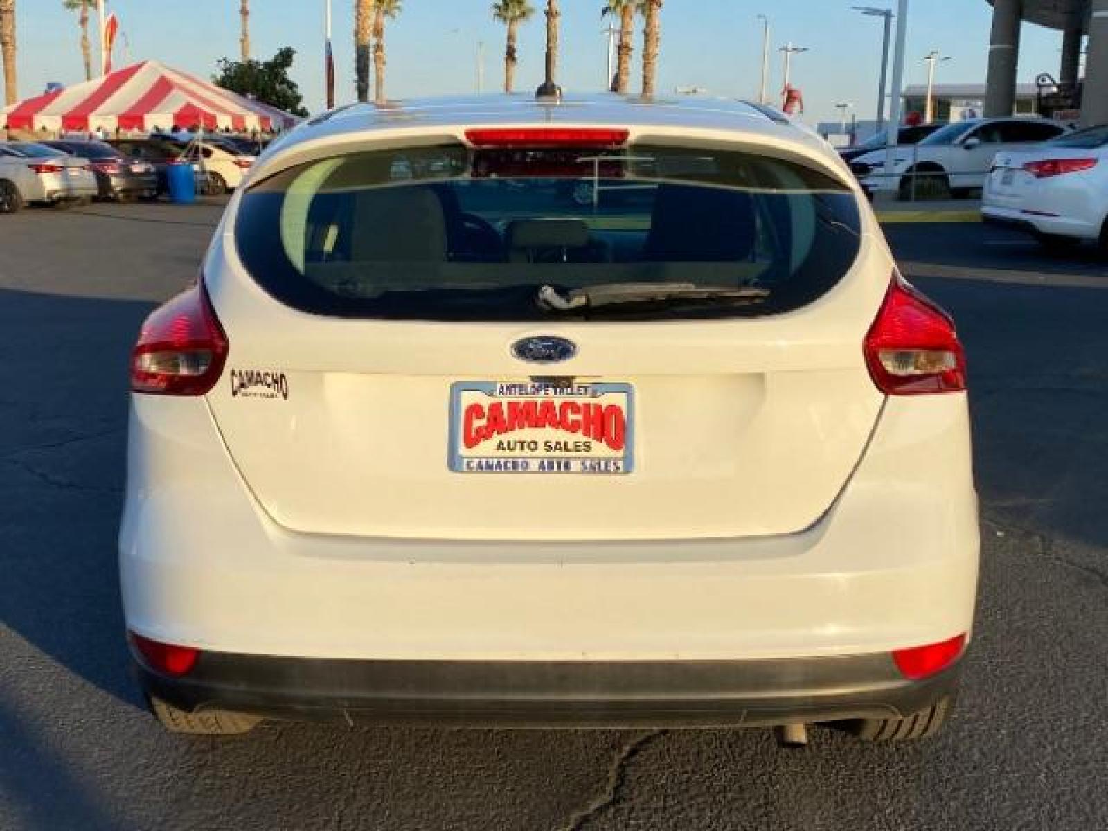 2016 WHITE Ford Focus (1FADP3K25GL) with an 4-Cyl Flex Fuel 2.0L engine, Manual 5-Spd transmission, located at 412 Auto Vista Drive, Palmdale, 93551, (661) 945-0620, 34.592636, -118.136681 - Photo #4