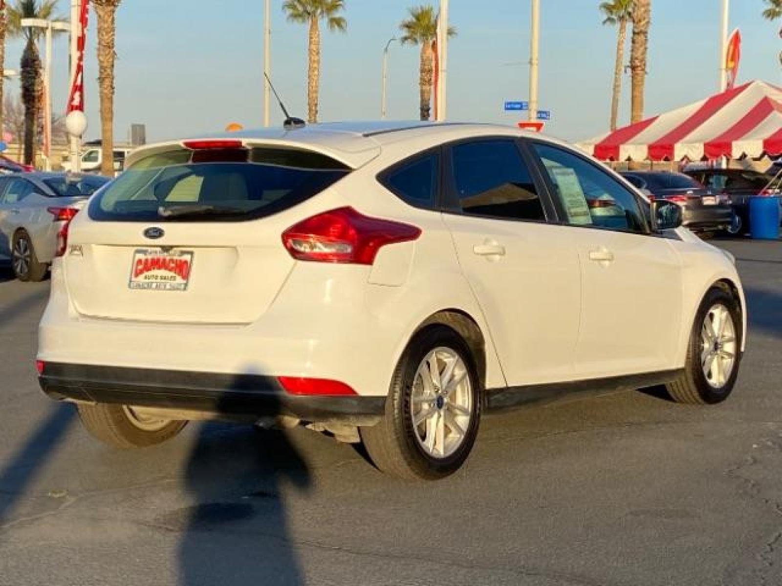 2016 WHITE Ford Focus (1FADP3K25GL) with an 4-Cyl Flex Fuel 2.0L engine, Manual 5-Spd transmission, located at 412 Auto Vista Drive, Palmdale, 93551, (661) 945-0620, 34.592636, -118.136681 - Photo #5