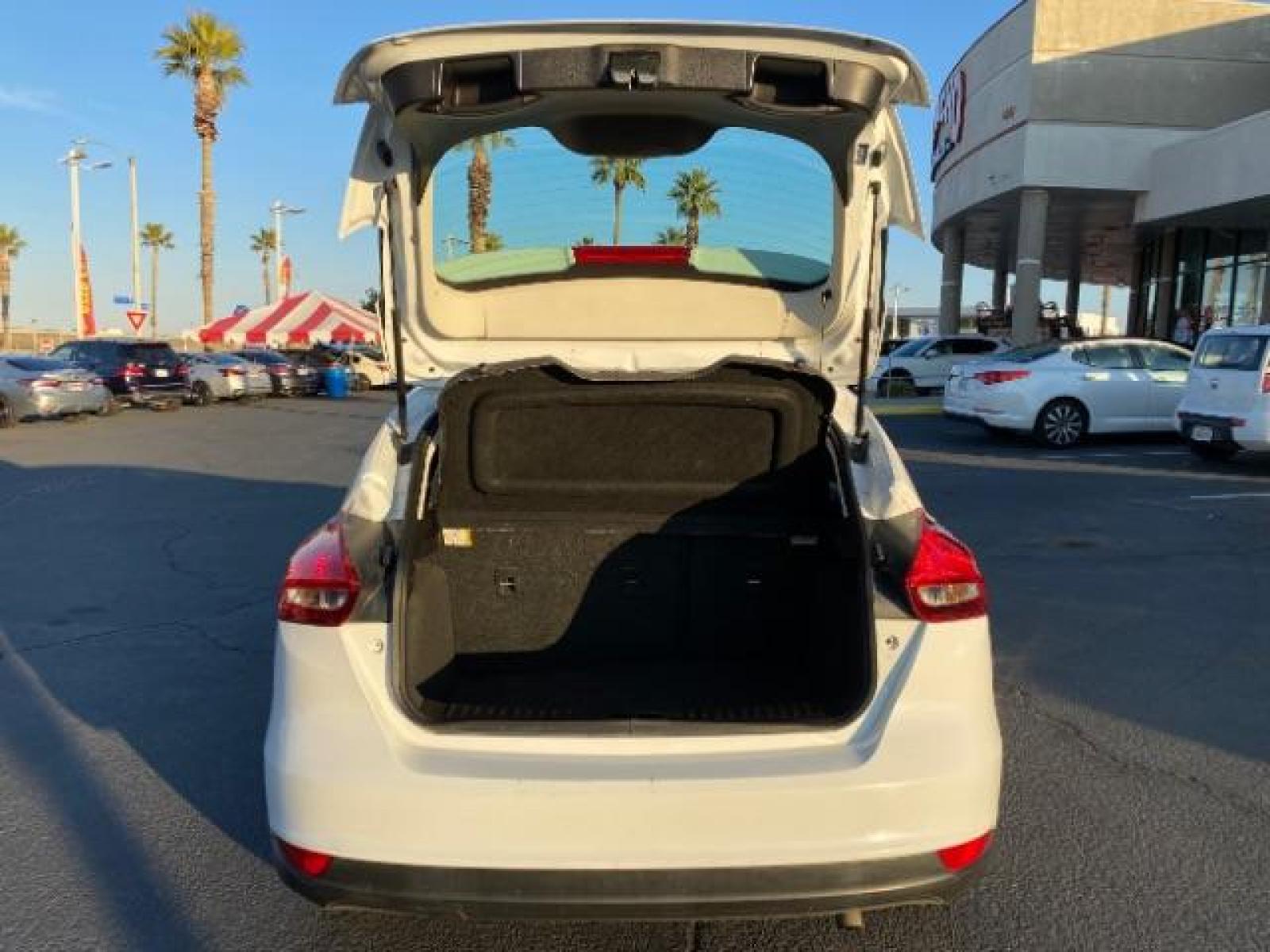 2016 WHITE Ford Focus (1FADP3K25GL) with an 4-Cyl Flex Fuel 2.0L engine, Manual 5-Spd transmission, located at 412 Auto Vista Drive, Palmdale, 93551, (661) 945-0620, 34.592636, -118.136681 - Photo #13