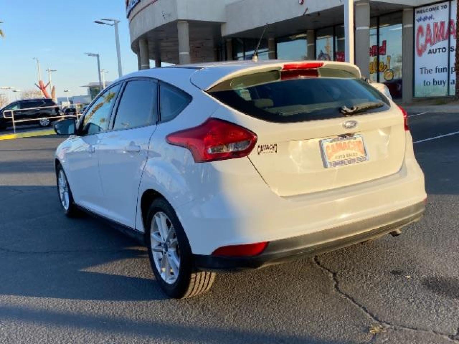 2016 WHITE Ford Focus (1FADP3K25GL) with an 4-Cyl Flex Fuel 2.0L engine, Manual 5-Spd transmission, located at 412 Auto Vista Drive, Palmdale, 93551, (661) 945-0620, 34.592636, -118.136681 - Photo #14