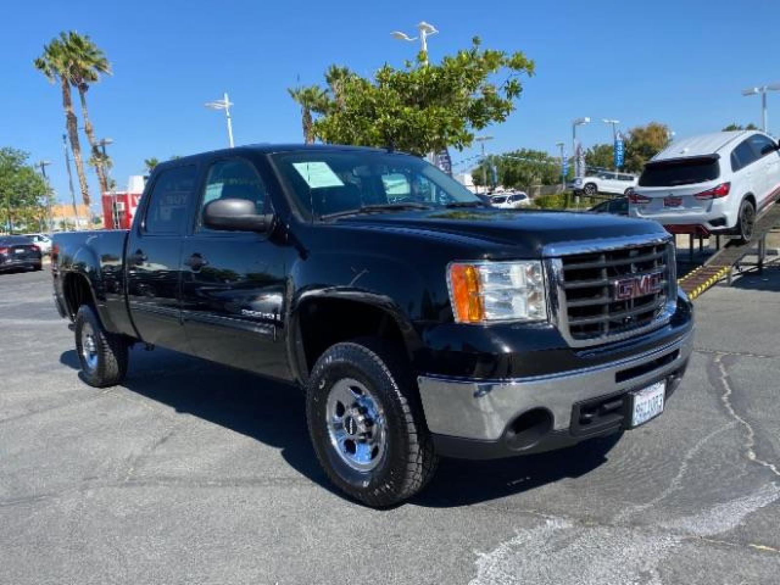 2009 BLACK GMC Sierra 2500 4WD (1GTHK53K89F) with an 8-Cyl 6 Liter engine, Automatic transmission, located at 412 Auto Vista Drive, Palmdale, CA, 93551, (661) 945-0620, 34.592636, -118.136681 - Photo #0