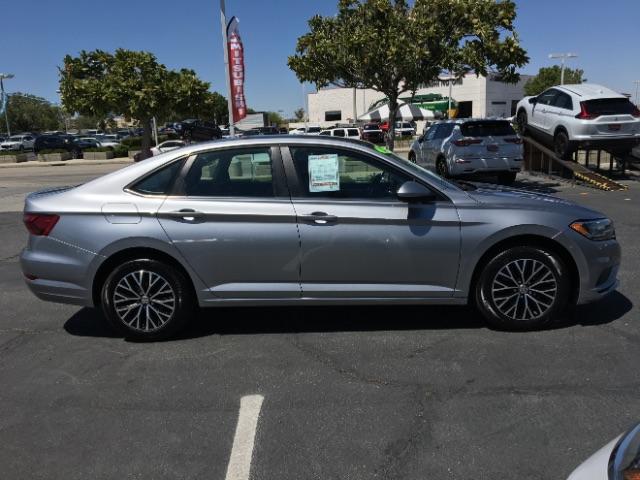 2021 BLACK Volkswagen Jetta (3VWC57BUXMM) with an 4-Cyl Turbo 1.4 Liter engine, Automatic 8-Spd and Tiptronic transmission, located at 412 Auto Vista Drive, Palmdale, 93551, (661) 945-0620, 34.592636, -118.136681 - Photo #7