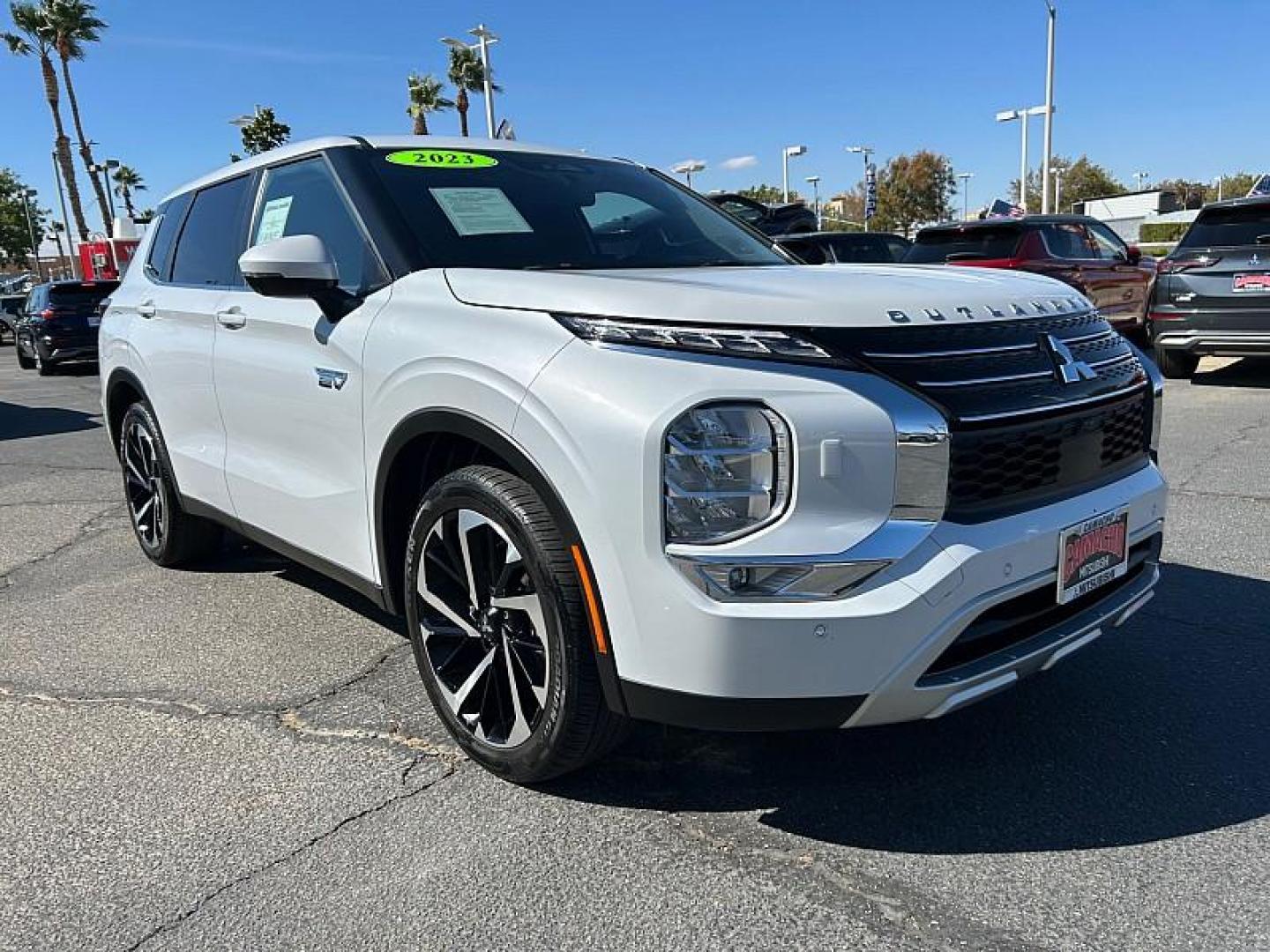 2023 WHITE Mitsubishi Outlander Plug-In Hybrid (JA4T5UA97PZ) with an 4-Cyl Hybrid 2.4 Liter engine, Automatic 1-Spd transmission, located at 412 Auto Vista Drive, Palmdale, CA, 93551, (661) 945-0620, 34.592636, -118.136681 - Photo#0