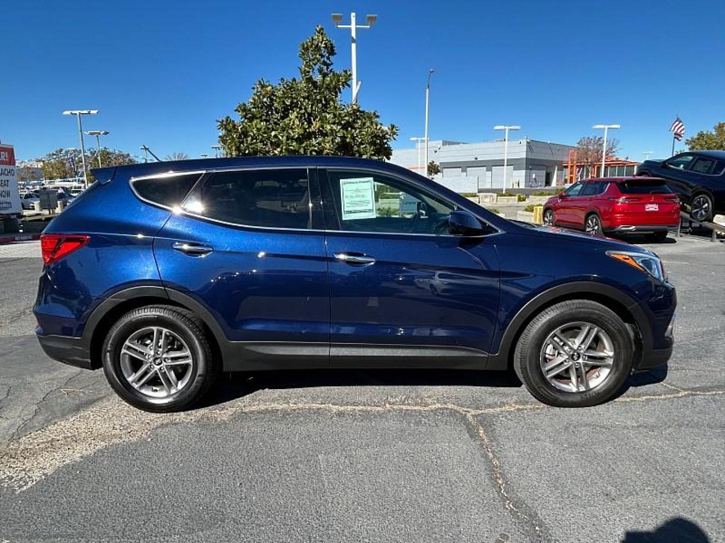 2018 BLUE Hyundai Santa Fe Sport (5XYZTDLB1JG) with an 4-Cyl GDI 2.4 Liter engine, Automatic 6-Spd w/Shiftronic transmission, located at 412 Auto Vista Drive, Palmdale, CA, 93551, (661) 945-0620, 34.592636, -118.136681 - Photo#8