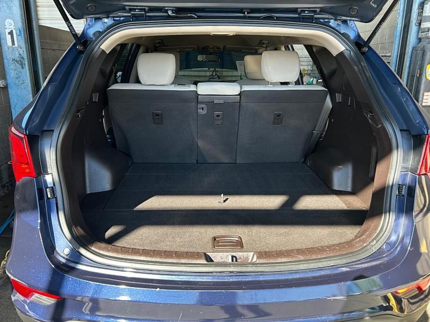 2018 BLUE Hyundai Santa Fe Sport (5XYZTDLB1JG) with an 4-Cyl GDI 2.4 Liter engine, Automatic 6-Spd w/Shiftronic transmission, located at 412 Auto Vista Drive, Palmdale, CA, 93551, (661) 945-0620, 34.592636, -118.136681 - Photo#20