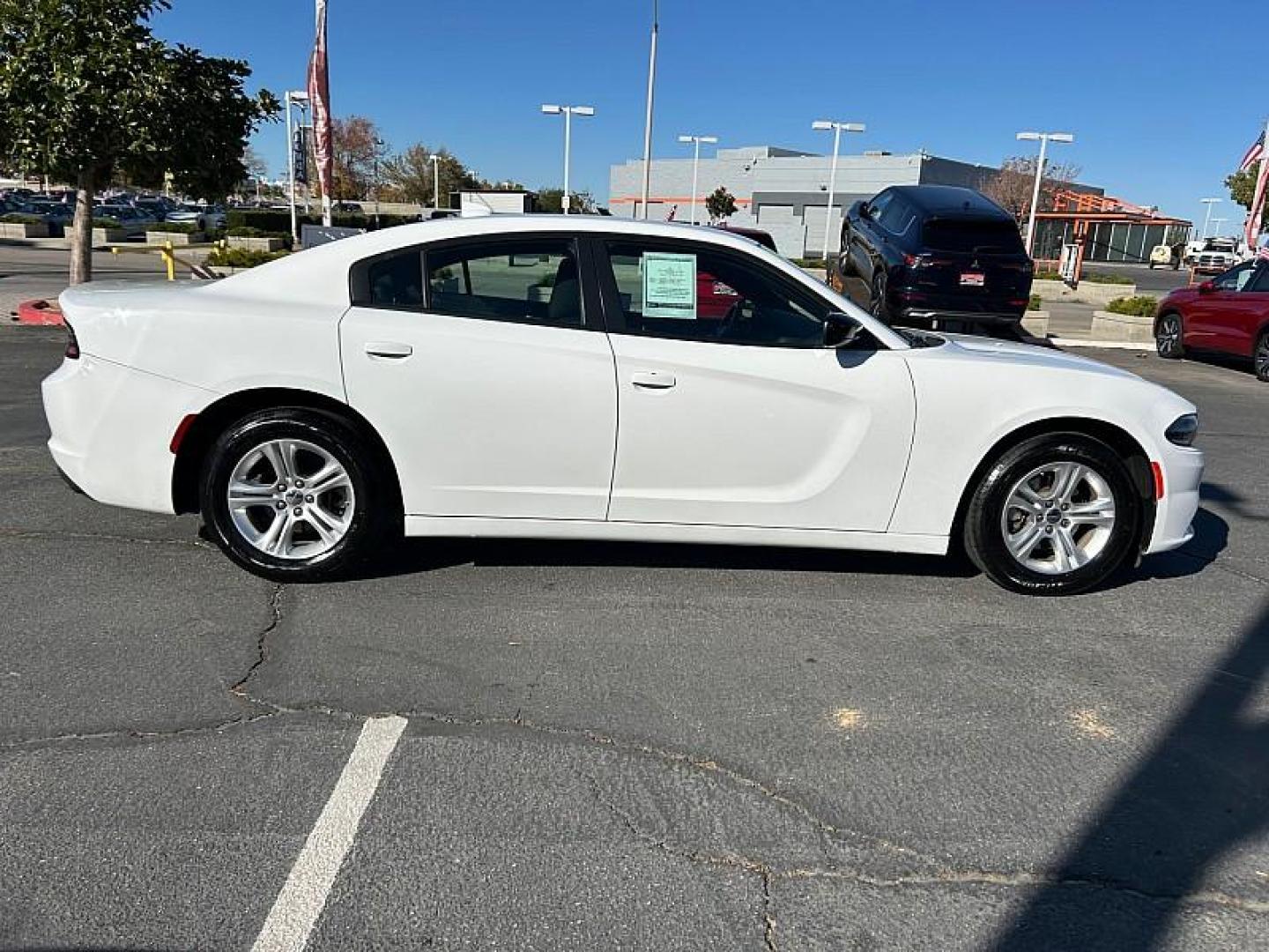 2023 WHITE Dodge Charger (2C3CDXBG9PH) with an V6 3.6 Liter engine, Automatic 8-Spd w/AutoStick transmission, located at 412 Auto Vista Drive, Palmdale, CA, 93551, (661) 945-0620, 34.592636, -118.136681 - Photo#11