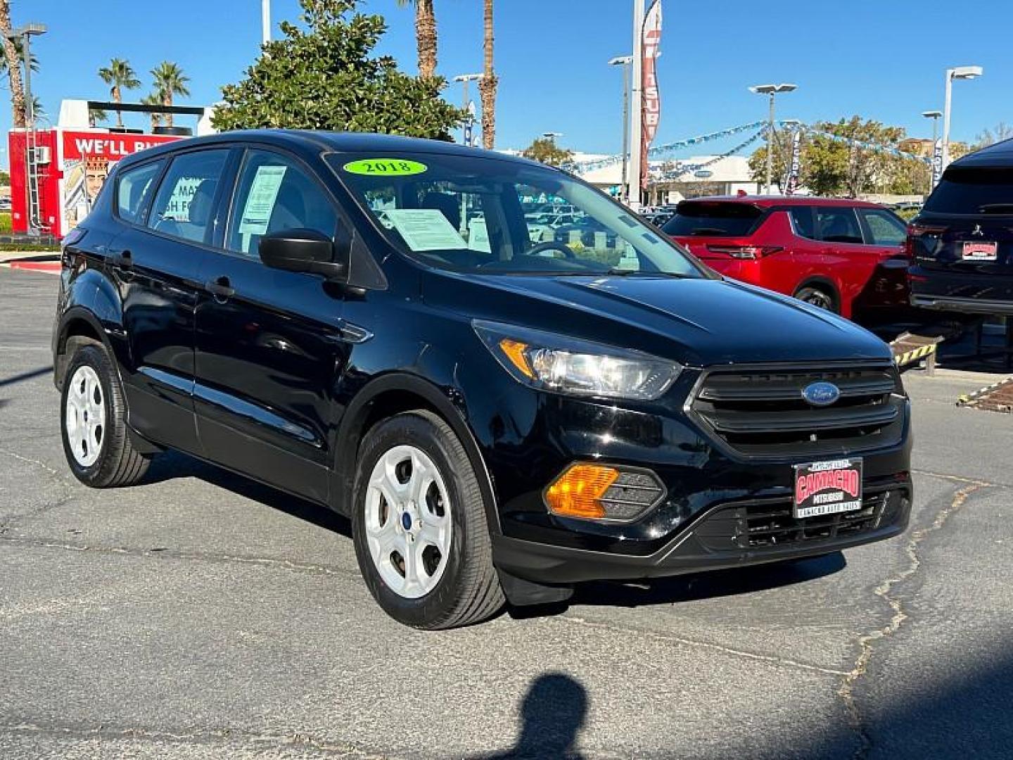 2018 BLACK Ford Escape (1FMCU0F77JU) with an 4-Cyl 2.5 Liter engine, Auto 6-Spd w/SelShft transmission, located at 412 Auto Vista Drive, Palmdale, CA, 93551, (661) 945-0620, 34.592636, -118.136681 - Photo#1