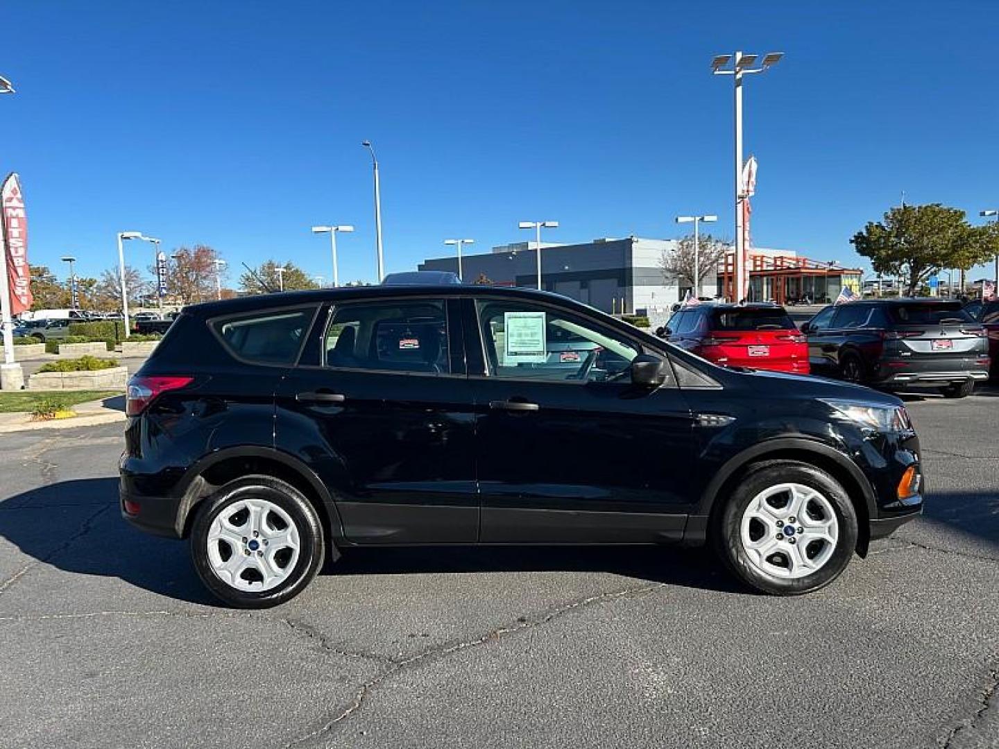 2018 BLACK Ford Escape (1FMCU0F77JU) with an 4-Cyl 2.5 Liter engine, Auto 6-Spd w/SelShft transmission, located at 412 Auto Vista Drive, Palmdale, CA, 93551, (661) 945-0620, 34.592636, -118.136681 - Photo#4