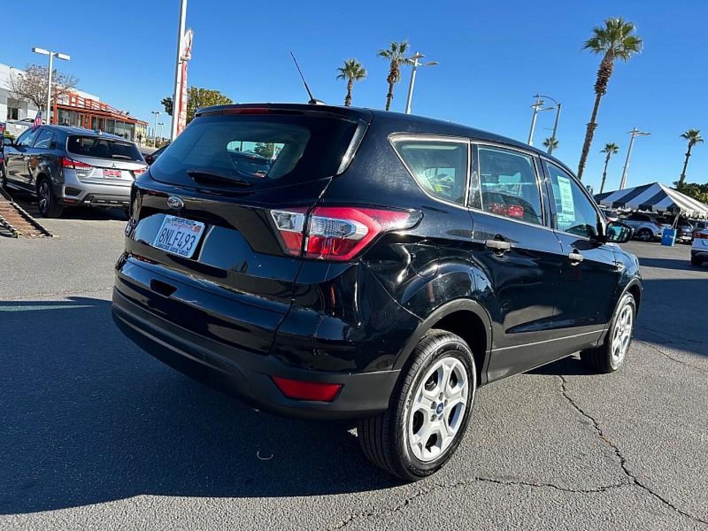 2018 BLACK Ford Escape (1FMCU0F77JU) with an 4-Cyl 2.5 Liter engine, Auto 6-Spd w/SelShft transmission, located at 412 Auto Vista Drive, Palmdale, CA, 93551, (661) 945-0620, 34.592636, -118.136681 - Photo#5