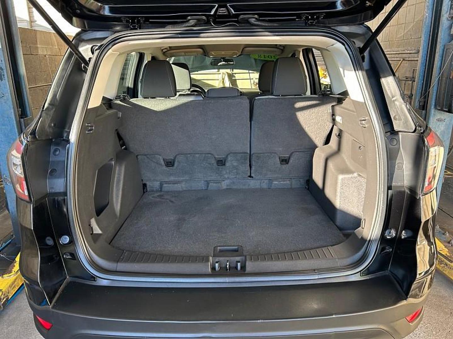 2018 BLACK Ford Escape (1FMCU0F77JU) with an 4-Cyl 2.5 Liter engine, Auto 6-Spd w/SelShft transmission, located at 412 Auto Vista Drive, Palmdale, CA, 93551, (661) 945-0620, 34.592636, -118.136681 - Photo#12