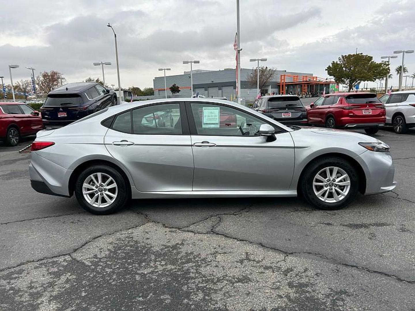 2025 SILVER Toyota Camry (4T1DAACK4SU) with an 4-Cyl Hybrid 2.5 Liter engine, Automatic CVT transmission, located at 412 Auto Vista Drive, Palmdale, CA, 93551, (661) 945-0620, 34.592636, -118.136681 - Photo#7
