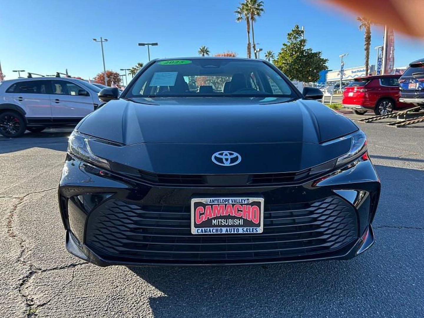 2025 BLACK Toyota Camry (4T1DAACK7SU) with an 4-Cyl Hybrid 2.5 Liter engine, Automatic CVT transmission, located at 412 Auto Vista Drive, Palmdale, CA, 93551, (661) 945-0620, 34.592636, -118.136681 - Photo#2