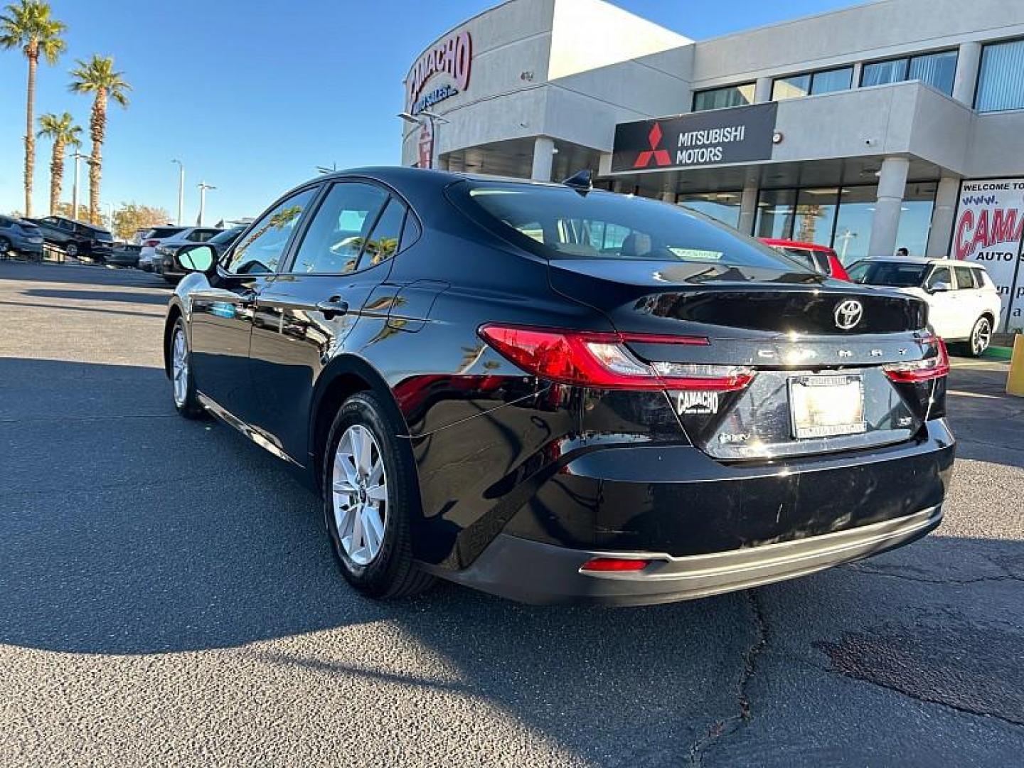 2025 BLACK Toyota Camry (4T1DAACK7SU) with an 4-Cyl Hybrid 2.5 Liter engine, Automatic CVT transmission, located at 412 Auto Vista Drive, Palmdale, CA, 93551, (661) 945-0620, 34.592636, -118.136681 - Photo#5
