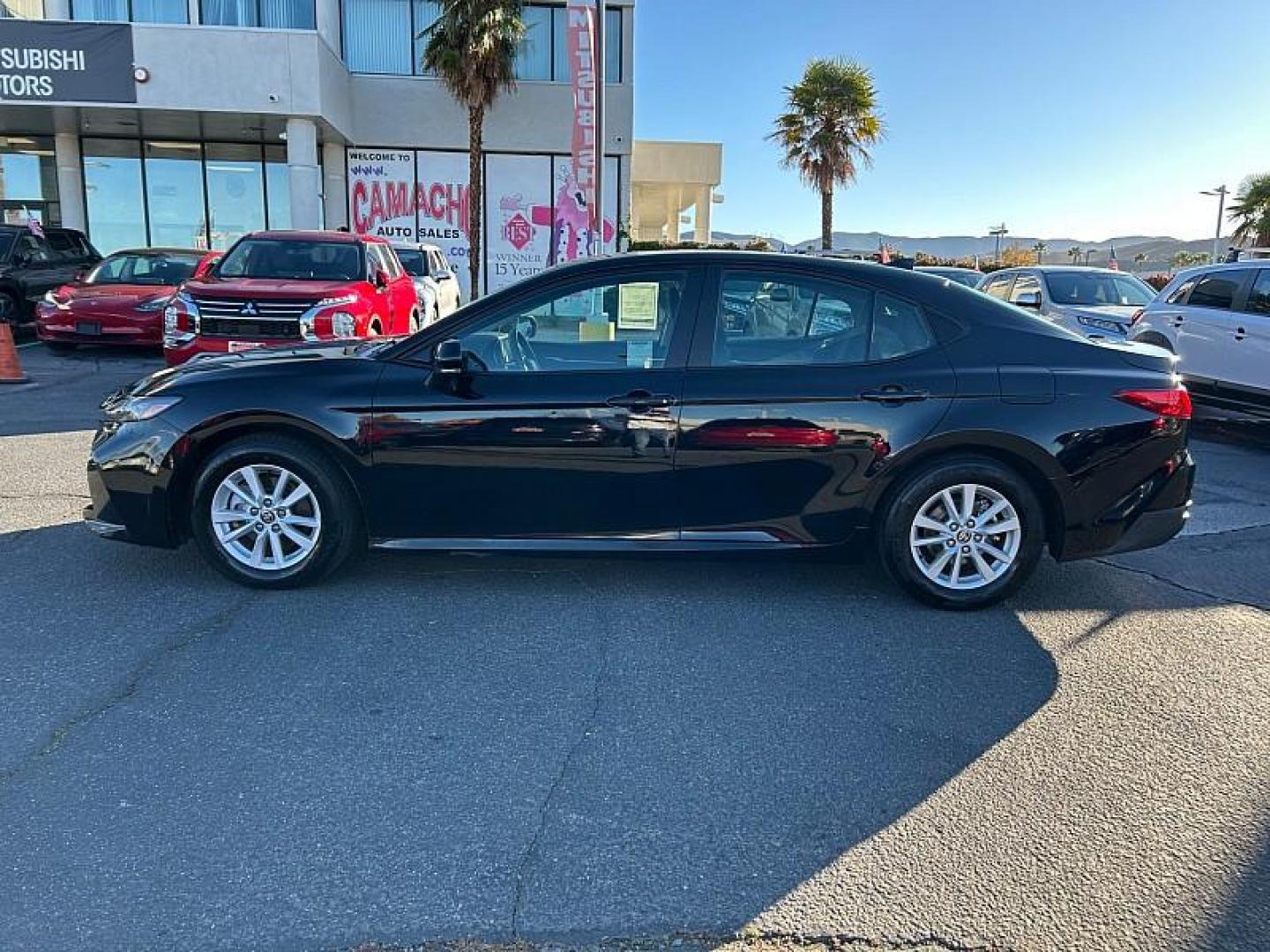 2025 BLACK Toyota Camry (4T1DAACK7SU) with an 4-Cyl Hybrid 2.5 Liter engine, Automatic CVT transmission, located at 412 Auto Vista Drive, Palmdale, CA, 93551, (661) 945-0620, 34.592636, -118.136681 - Photo#6
