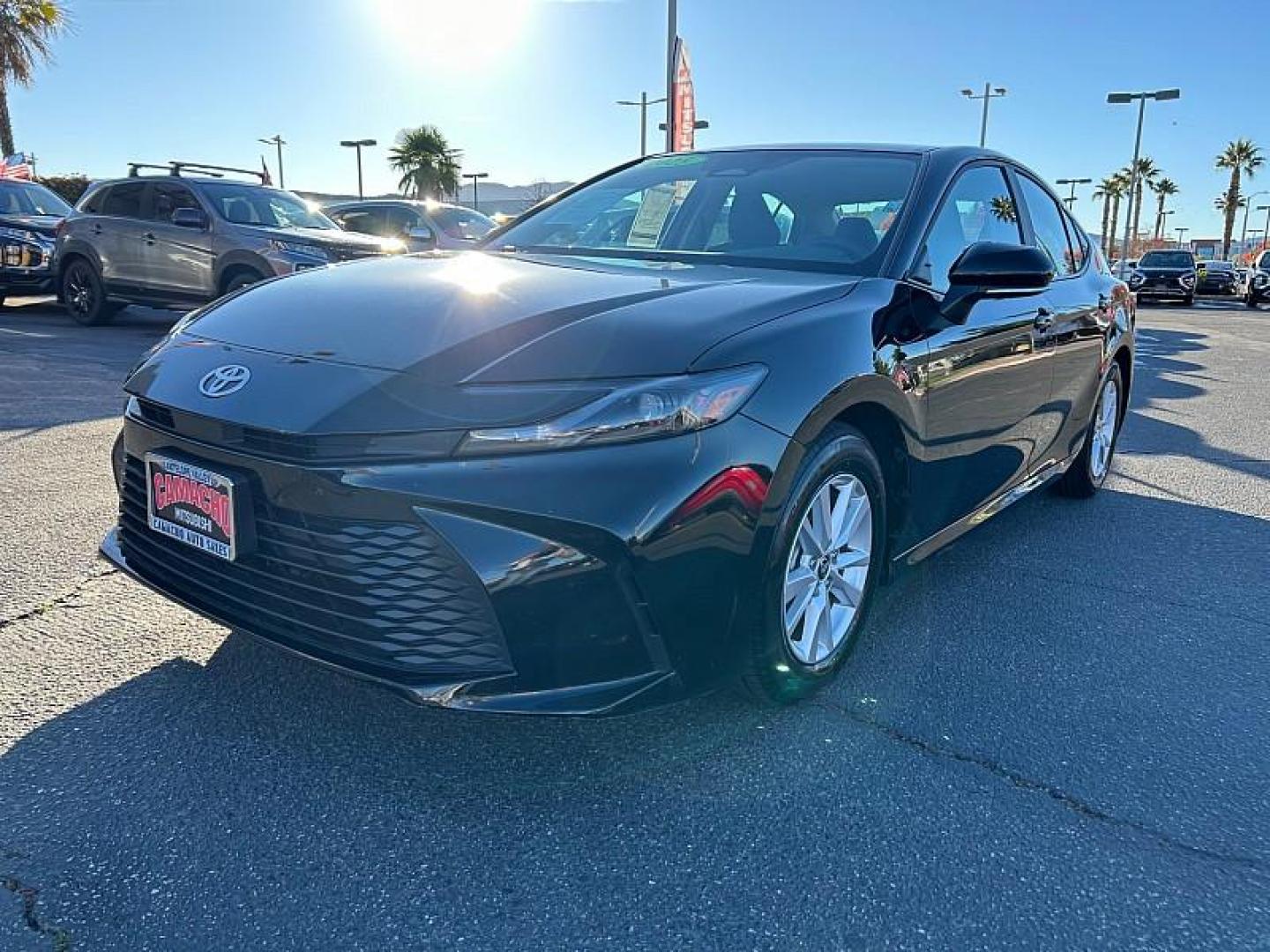 2025 BLACK Toyota Camry (4T1DAACK7SU) with an 4-Cyl Hybrid 2.5 Liter engine, Automatic CVT transmission, located at 412 Auto Vista Drive, Palmdale, CA, 93551, (661) 945-0620, 34.592636, -118.136681 - Photo#7