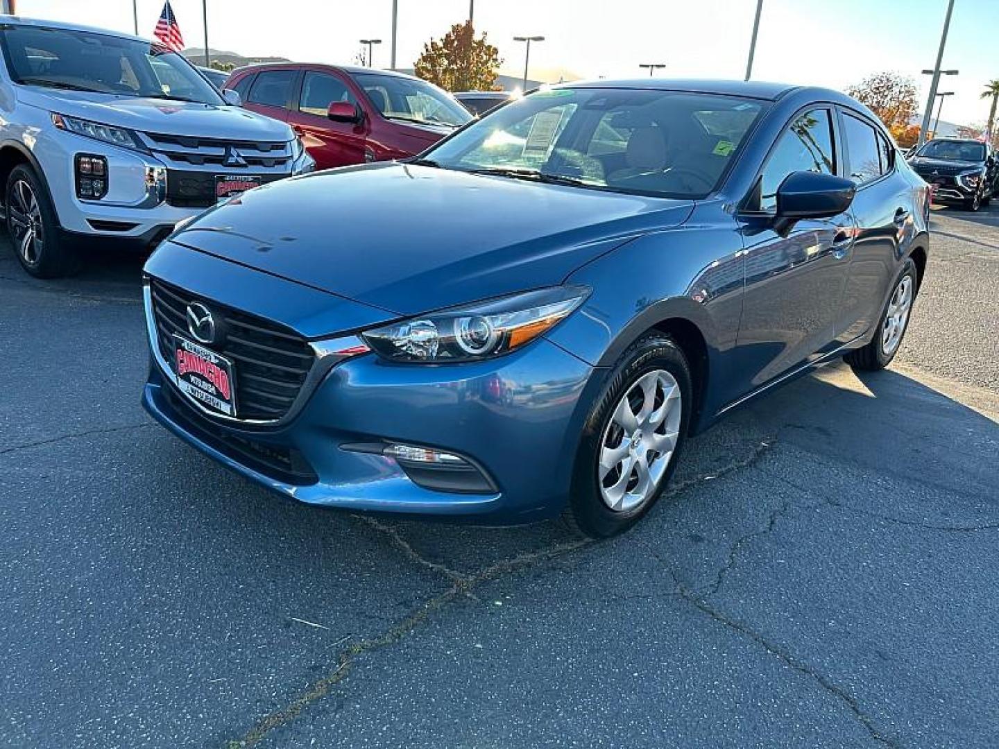 2018 BLUE Mazda Mazda3 (3MZBN1U70JM) with an 4-Cyl SKYACTIV-G 2.0L engine, Auto 6-Spd SKYACTIV-Drv transmission, located at 412 Auto Vista Drive, Palmdale, CA, 93551, (661) 945-0620, 34.592636, -118.136681 - Photo#2