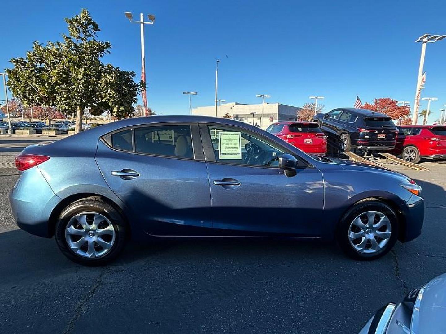 2018 BLUE Mazda Mazda3 (3MZBN1U70JM) with an 4-Cyl SKYACTIV-G 2.0L engine, Auto 6-Spd SKYACTIV-Drv transmission, located at 412 Auto Vista Drive, Palmdale, CA, 93551, (661) 945-0620, 34.592636, -118.136681 - Photo#5