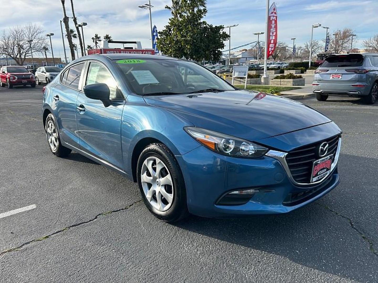 2018 BLUE Mazda Mazda3 (3MZBN1U70JM) with an 4-Cyl SKYACTIV-G 2.0L engine, Auto 6-Spd SKYACTIV-Drv transmission, located at 412 Auto Vista Drive, Palmdale, CA, 93551, (661) 945-0620, 34.592636, -118.136681 - Photo#1