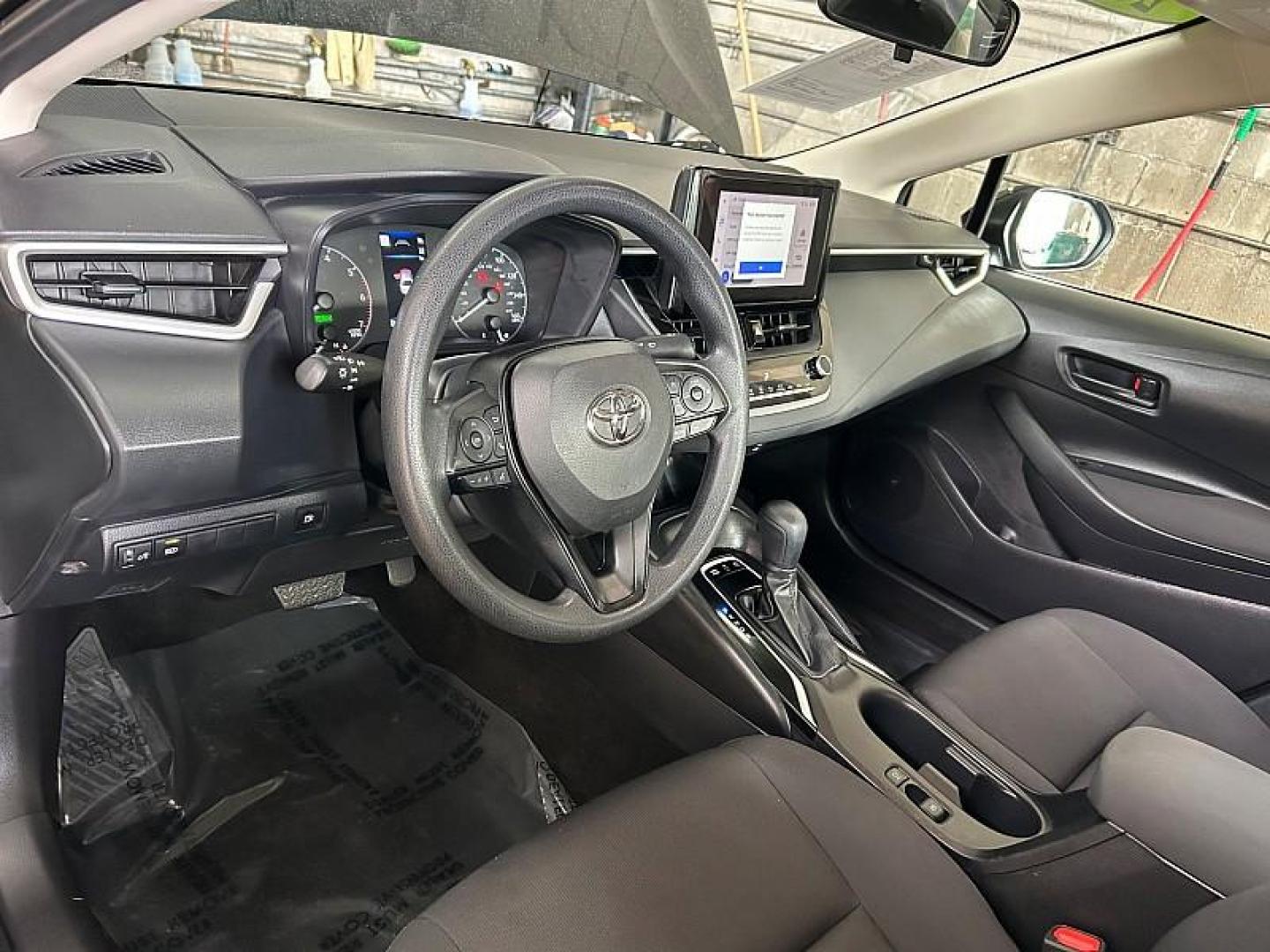 2025 BLACK Toyota Corolla (JTDBCMFE7S3) with an 4-Cyl Hybrid 1.8 Liter engine, Automatic CVT transmission, located at 412 Auto Vista Drive, Palmdale, CA, 93551, (661) 945-0620, 34.592636, -118.136681 - Photo#18