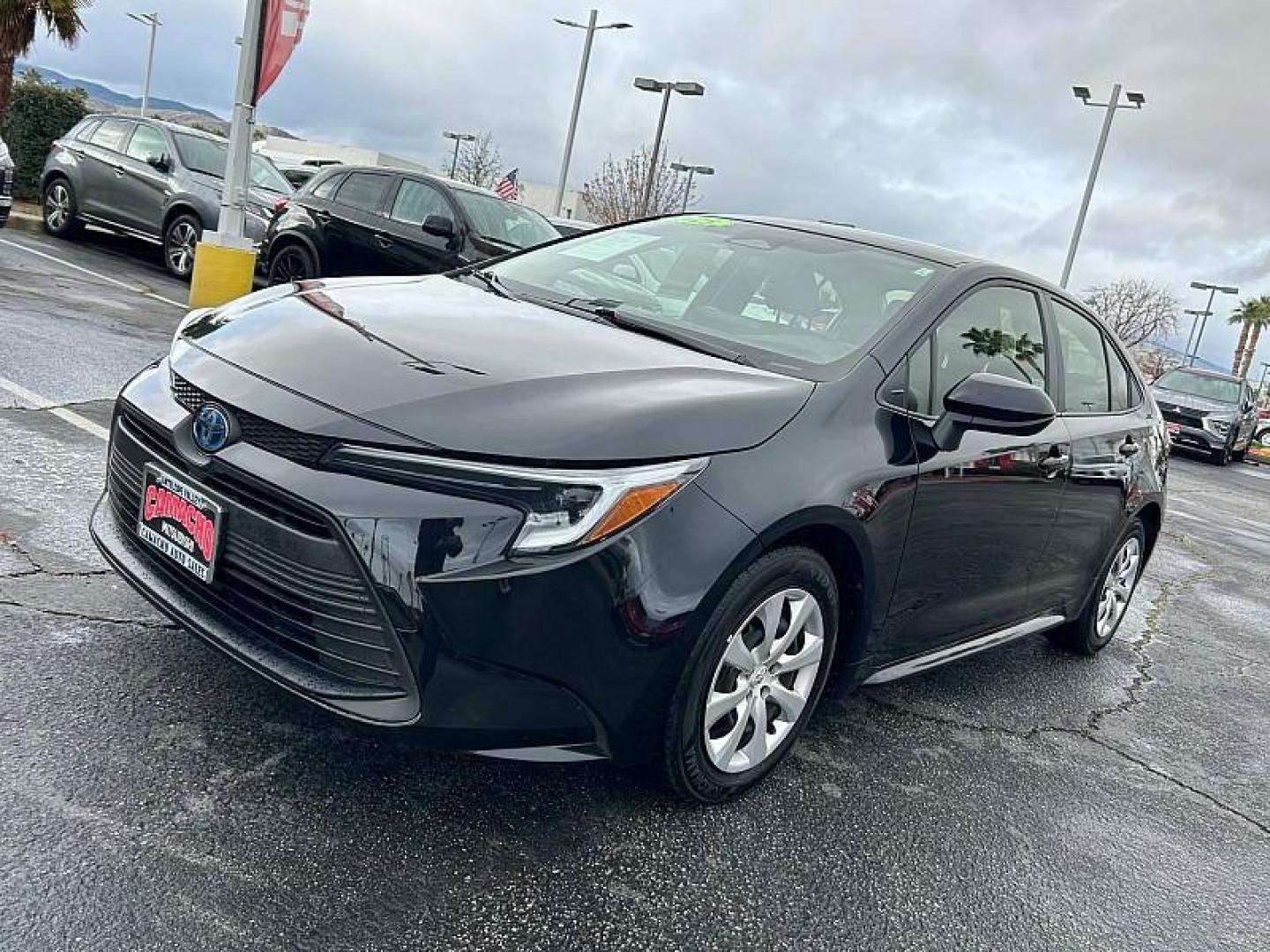 2025 BLACK Toyota Corolla (JTDBCMFE7S3) with an 4-Cyl Hybrid 1.8 Liter engine, Automatic CVT transmission, located at 412 Auto Vista Drive, Palmdale, CA, 93551, (661) 945-0620, 34.592636, -118.136681 - Photo#7