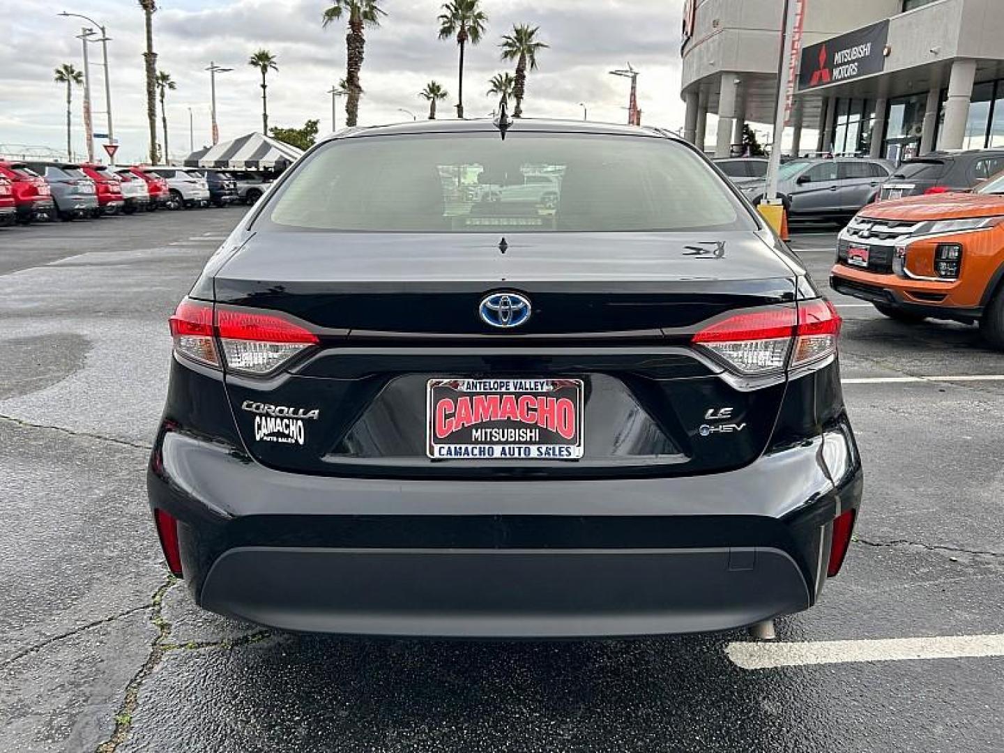 2025 BLACK Toyota Corolla (JTDBCMFE7S3) with an 4-Cyl Hybrid 1.8 Liter engine, Automatic CVT transmission, located at 412 Auto Vista Drive, Palmdale, CA, 93551, (661) 945-0620, 34.592636, -118.136681 - Photo#4