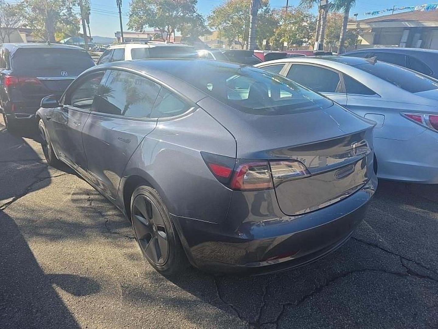 2023 GRAY Tesla Model 3 (5YJ3E1EB0PF) with an Dual AC Electric Motors engine, Single-Speed Fixed Gear transmission, located at 412 Auto Vista Drive, Palmdale, CA, 93551, (661) 945-0620, 34.592636, -118.136681 - Photo#2