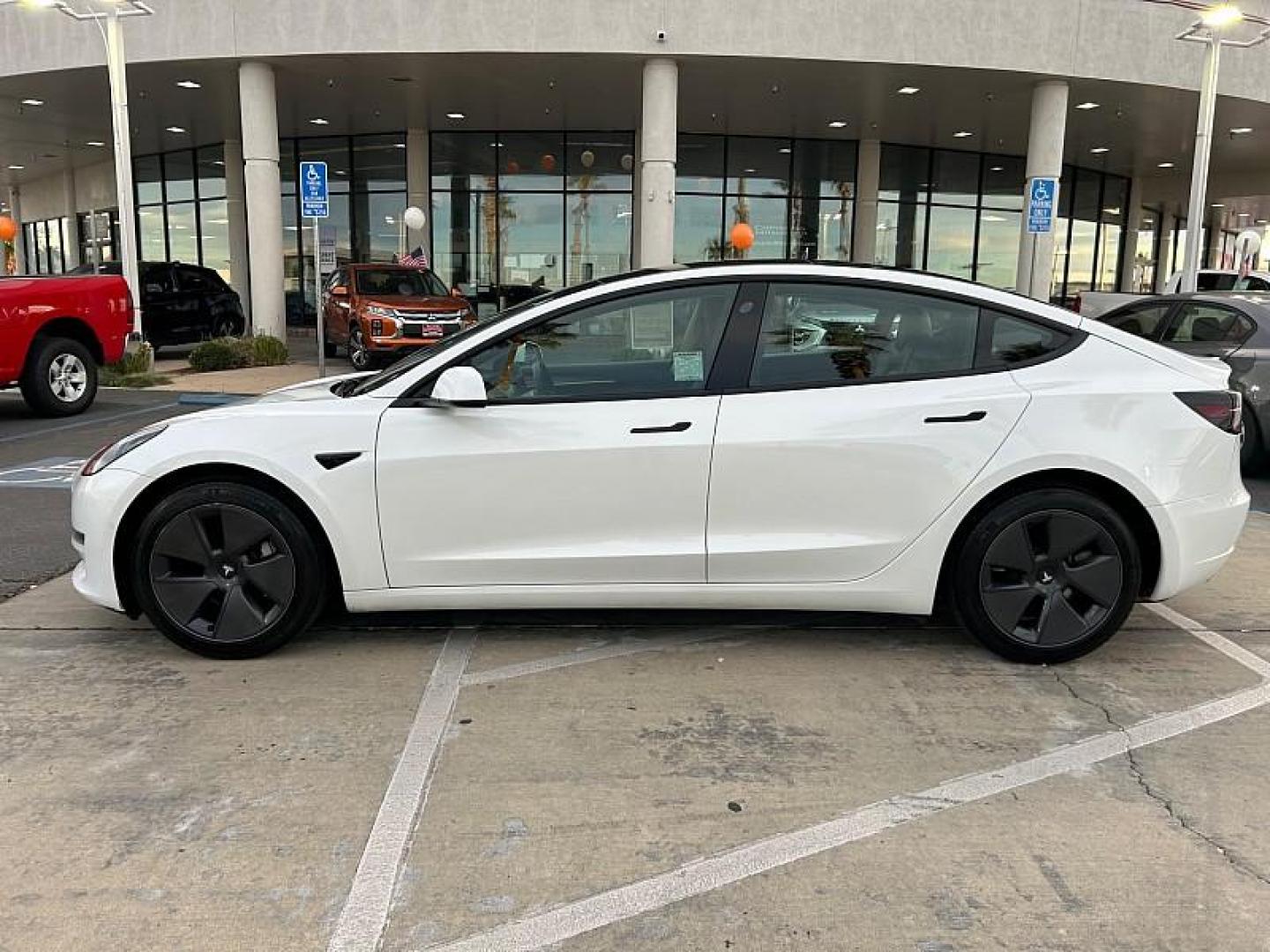 2022 WHITE Tesla Model 3 (5YJ3E1EA3NF) with an AC Electric Motor engine, Single-Speed Fixed Gear transmission, located at 412 Auto Vista Drive, Palmdale, CA, 93551, (661) 945-0620, 34.592636, -118.136681 - Photo#5