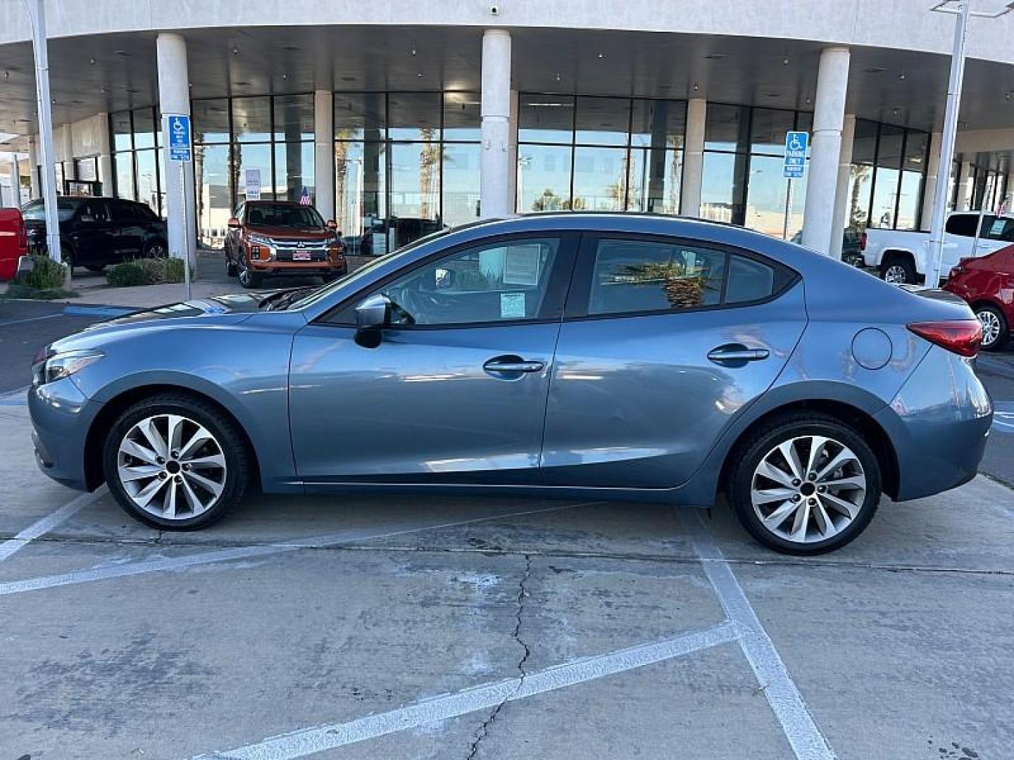 2015 BLUE Mazda Mazda3 (3MZBM1U71FM) with an 4-Cyl SKYACTIV-G 2.0L engine, Auto 6-Spd SKYACTIV-Drv transmission, located at 412 Auto Vista Drive, Palmdale, CA, 93551, (661) 945-0620, 34.592636, -118.136681 - Photo#3