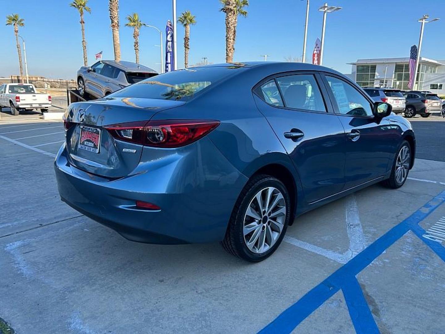 2015 BLUE Mazda Mazda3 (3MZBM1U71FM) with an 4-Cyl SKYACTIV-G 2.0L engine, Auto 6-Spd SKYACTIV-Drv transmission, located at 412 Auto Vista Drive, Palmdale, CA, 93551, (661) 945-0620, 34.592636, -118.136681 - Photo#6