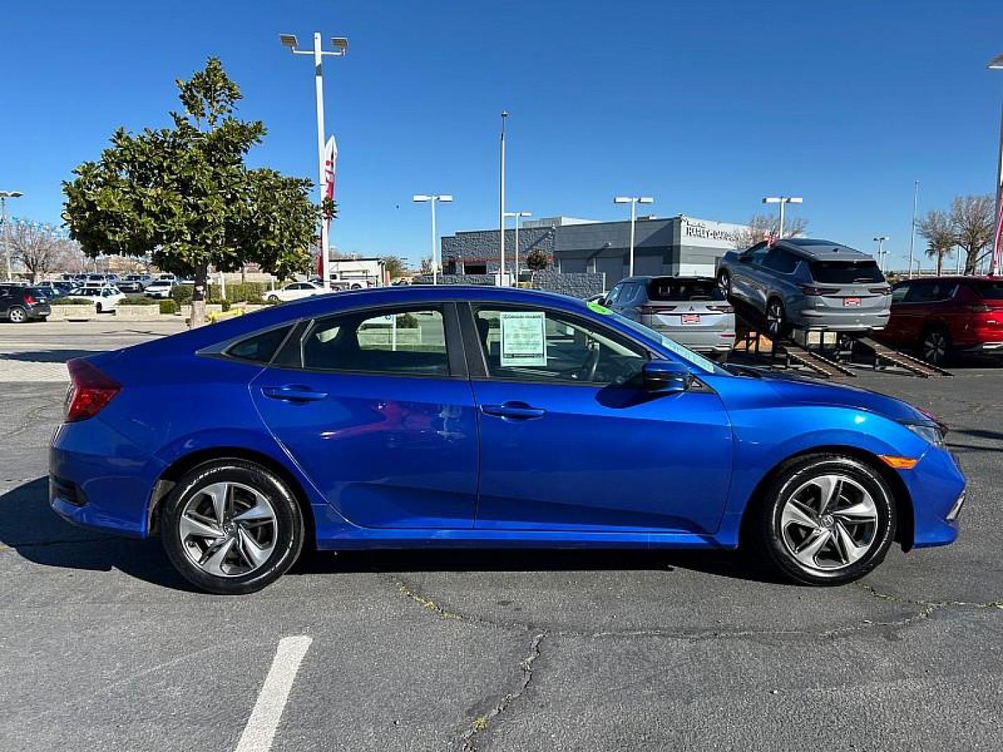 2019 BLUE Honda Civic Sedan (2HGFC2F64KH) with an 4-Cyl 2 Liter engine, Automatic CVT transmission, located at 412 Auto Vista Drive, Palmdale, CA, 93551, (661) 945-0620, 34.592636, -118.136681 - Photo#2