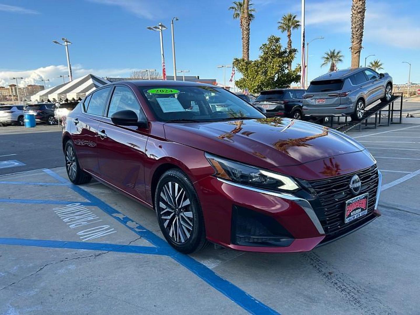 2024 RED Nissan Altima (1N4BL4DVXRN) with an 4-Cyl 2.5 Liter engine, Automatic Xtronic CVT transmission, located at 412 Auto Vista Drive, Palmdale, CA, 93551, (661) 945-0620, 34.592636, -118.136681 - Photo#1