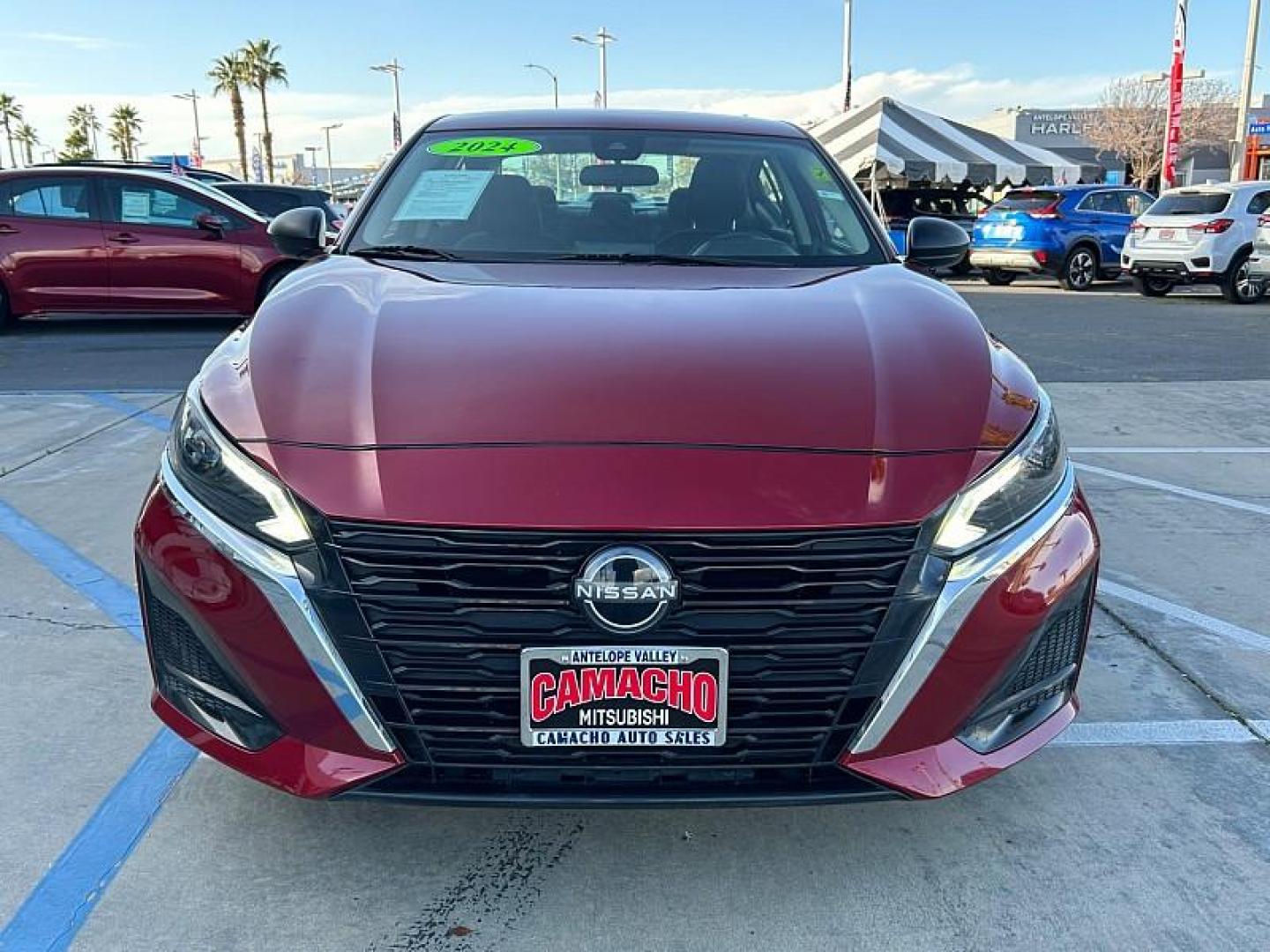 2024 RED Nissan Altima (1N4BL4DVXRN) with an 4-Cyl 2.5 Liter engine, Automatic Xtronic CVT transmission, located at 412 Auto Vista Drive, Palmdale, CA, 93551, (661) 945-0620, 34.592636, -118.136681 - Photo#2