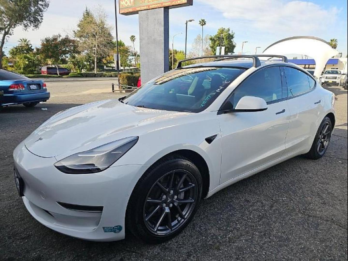 2021 WHITE Tesla Model 3 (5YJ3E1EA9MF) with an AC Electric Motor engine, Single-Speed Fixed Gear transmission, located at 412 Auto Vista Drive, Palmdale, CA, 93551, (661) 945-0620, 34.592636, -118.136681 - Photo#3
