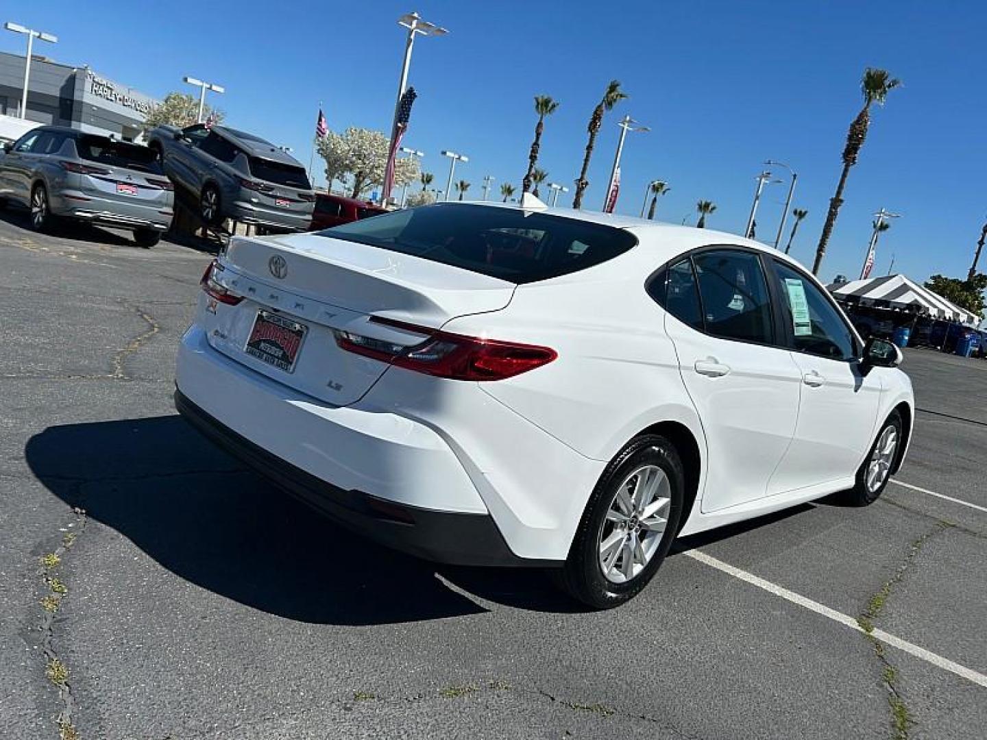 2025 WHITE Toyota Camry (4T1DAACK2SU) with an 4-Cyl Hybrid 2.5 Liter engine, Automatic CVT transmission, located at 412 Auto Vista Drive, Palmdale, CA, 93551, (661) 945-0620, 34.592636, -118.136681 - Photo#2