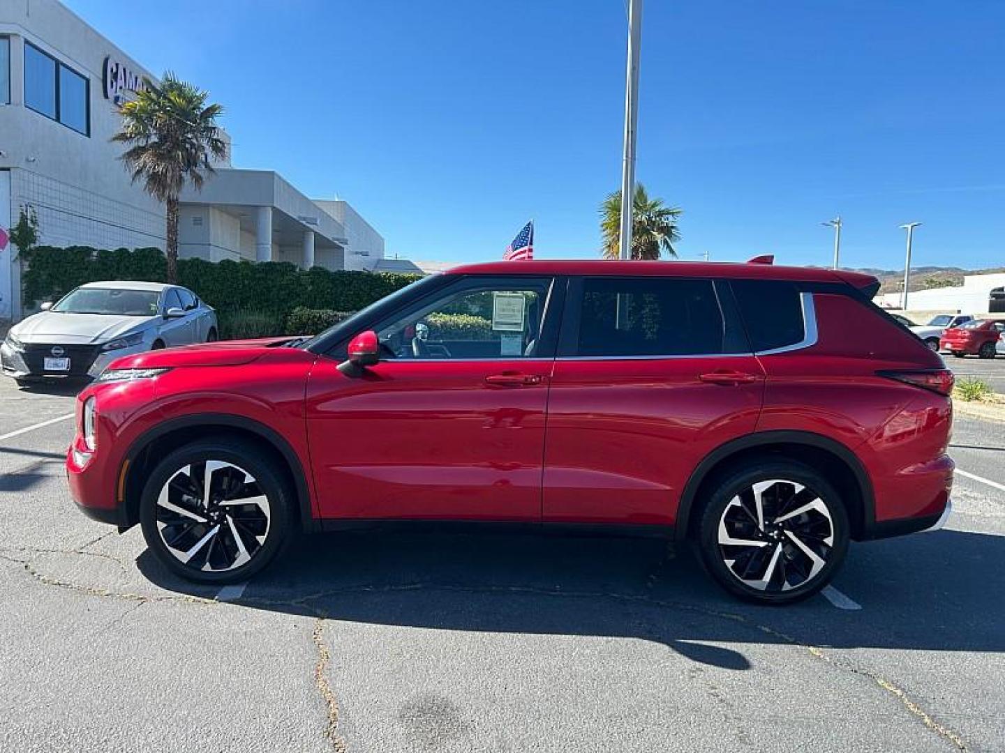 2023 RED Mitsubishi Outlander (JA4J3UA82PZ) with an 4-Cyl 2.5 Liter engine, Automatic CVT transmission, located at 412 Auto Vista Drive, Palmdale, CA, 93551, (661) 945-0620, 34.592636, -118.136681 - Photo#3