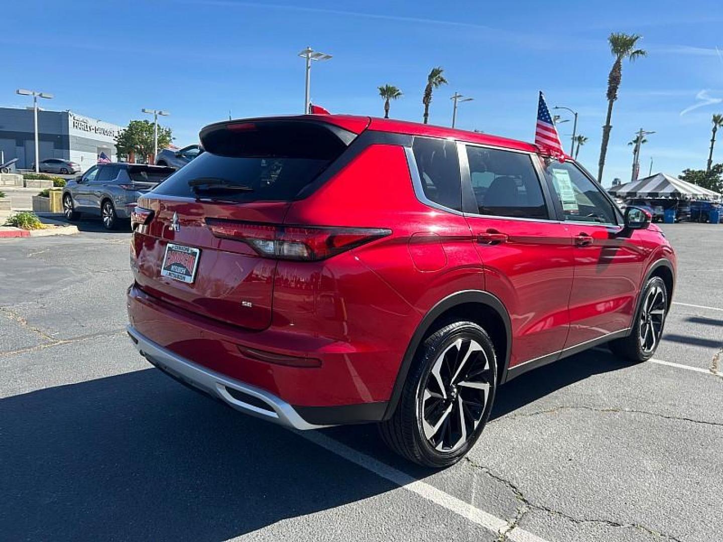 2023 RED Mitsubishi Outlander (JA4J3UA82PZ) with an 4-Cyl 2.5 Liter engine, Automatic CVT transmission, located at 412 Auto Vista Drive, Palmdale, CA, 93551, (661) 945-0620, 34.592636, -118.136681 - Photo#6