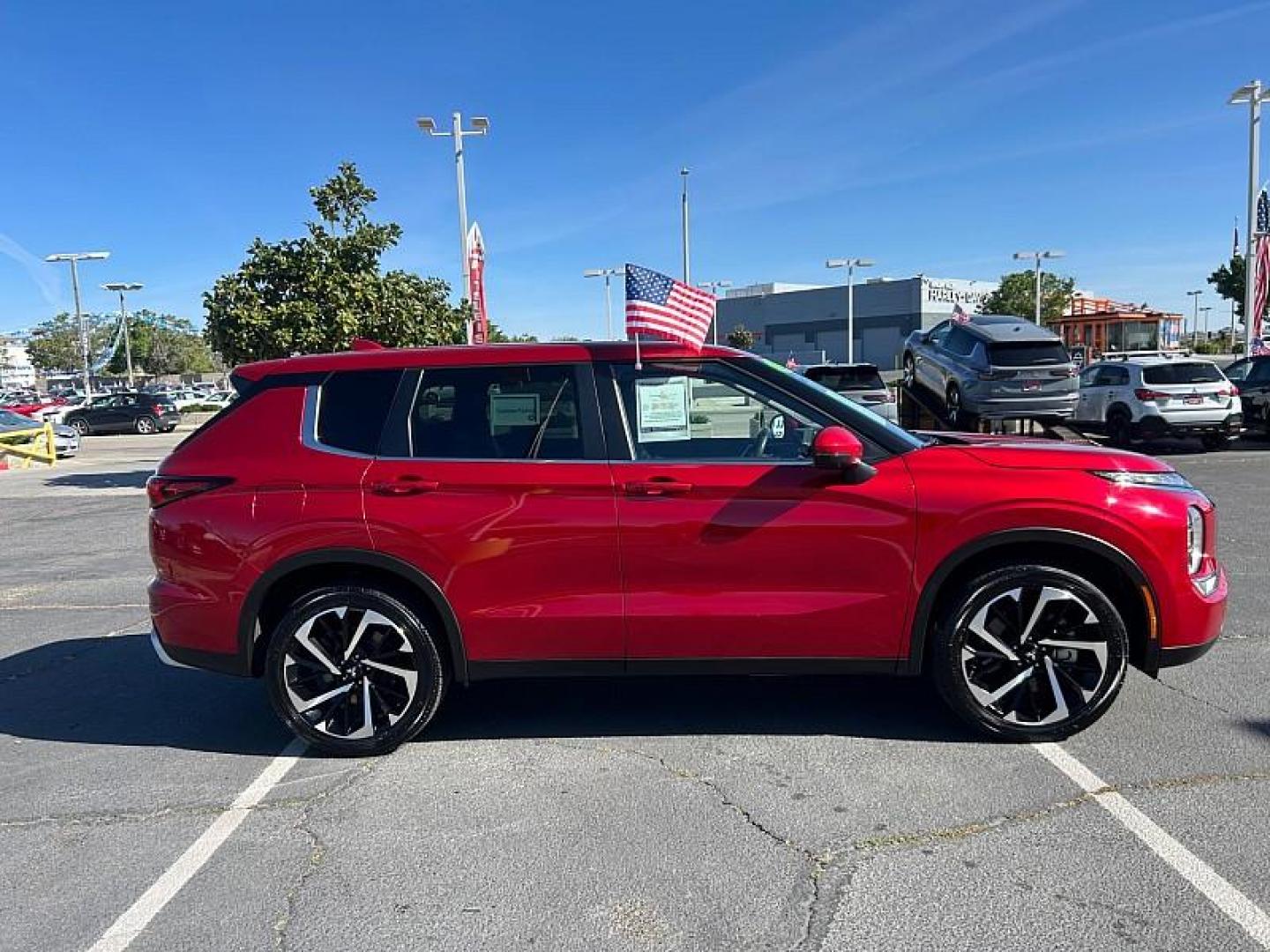 2023 RED Mitsubishi Outlander (JA4J3UA82PZ) with an 4-Cyl 2.5 Liter engine, Automatic CVT transmission, located at 412 Auto Vista Drive, Palmdale, CA, 93551, (661) 945-0620, 34.592636, -118.136681 - Photo#7