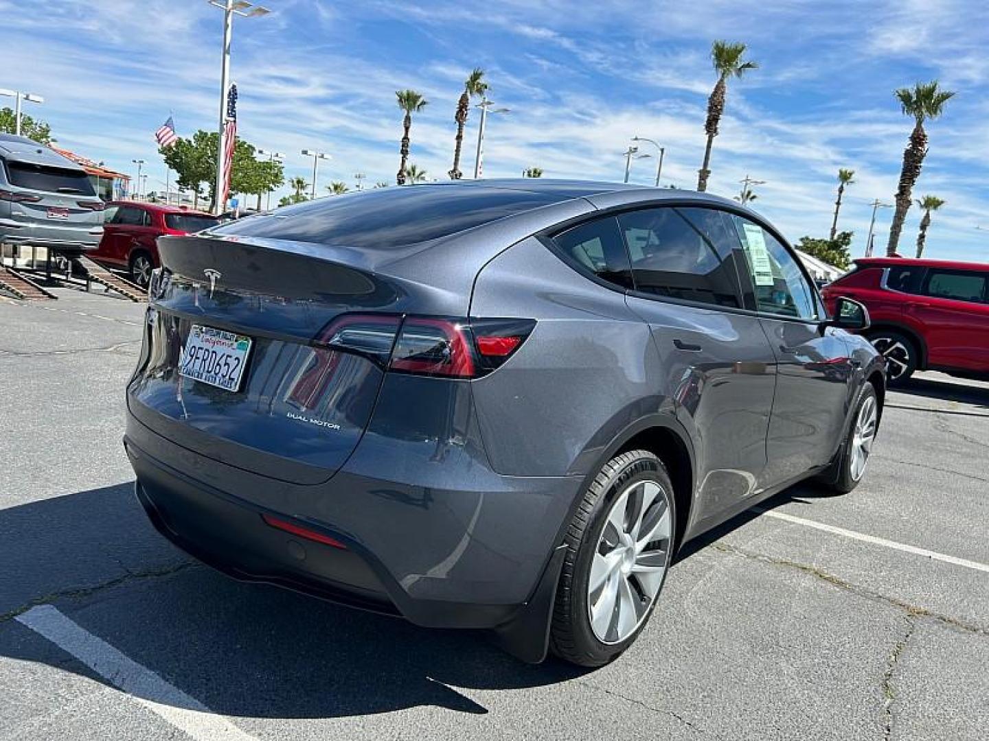 2023 GRAY Tesla Model Y (7SAYGDEE0PA) with an Dual AC Electric Motors engine, Single-Speed Fixed Gear transmission, located at 412 Auto Vista Drive, Palmdale, CA, 93551, (661) 945-0620, 34.592636, -118.136681 - Photo#2