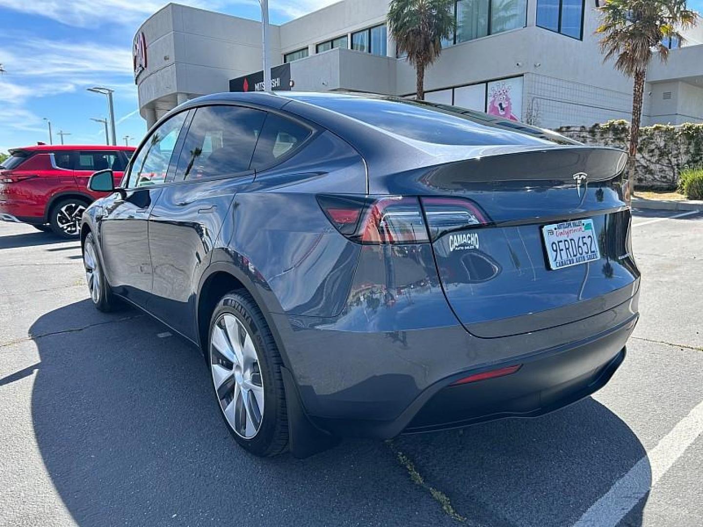 2023 GRAY Tesla Model Y (7SAYGDEE0PA) with an Dual AC Electric Motors engine, Single-Speed Fixed Gear transmission, located at 412 Auto Vista Drive, Palmdale, CA, 93551, (661) 945-0620, 34.592636, -118.136681 - Photo#4