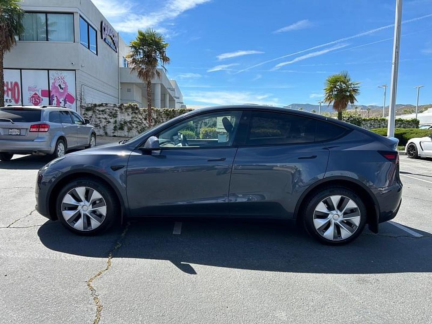 2023 GRAY Tesla Model Y (7SAYGDEE0PA) with an Dual AC Electric Motors engine, Single-Speed Fixed Gear transmission, located at 412 Auto Vista Drive, Palmdale, CA, 93551, (661) 945-0620, 34.592636, -118.136681 - Photo#5