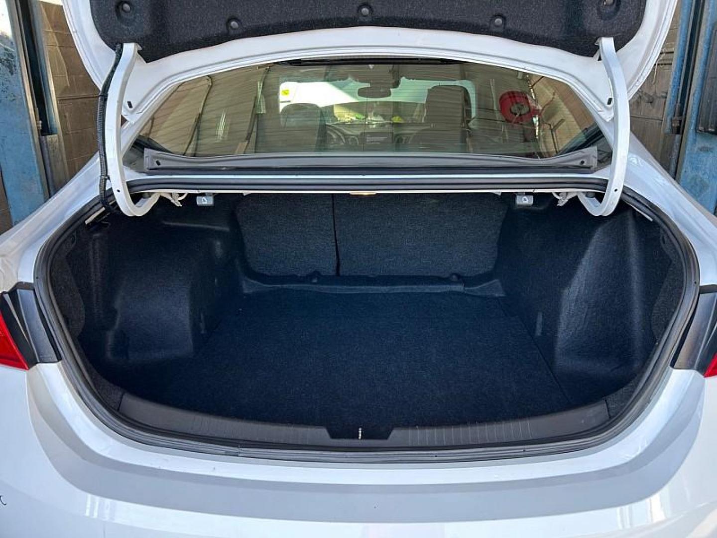 2024 WHITE Chevrolet Malibu (1G1ZD5ST7RF) with an 4-Cyl Turbo 1.5 Liter engine, Automatic CVT transmission, located at 412 Auto Vista Drive, Palmdale, CA, 93551, (661) 945-0620, 34.592636, -118.136681 - Photo#5