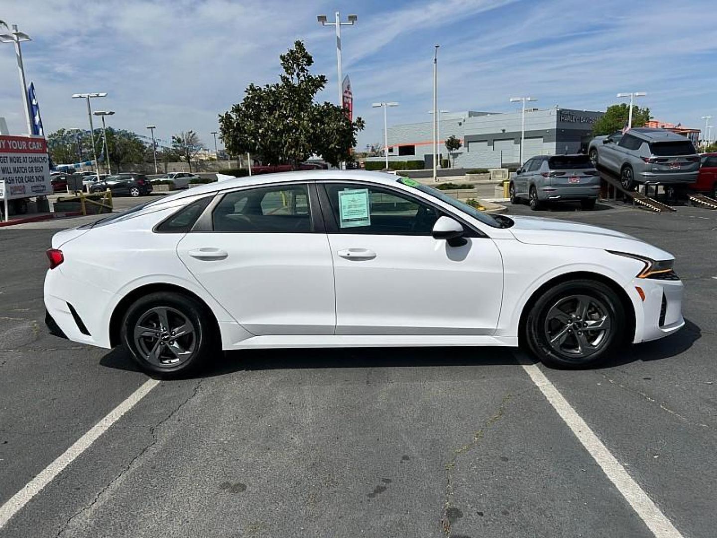 2023 WHITE Kia K5 (5XXG14J26PG) with an 4-Cyl Turbo 1.6 Liter engine, Automatic 8-Spd transmission, located at 412 Auto Vista Drive, Palmdale, CA, 93551, (661) 945-0620, 34.592636, -118.136681 - Photo#7