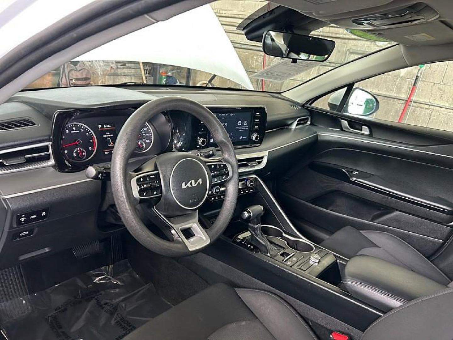 2023 WHITE Kia K5 (5XXG14J26PG) with an 4-Cyl Turbo 1.6 Liter engine, Automatic 8-Spd transmission, located at 412 Auto Vista Drive, Palmdale, CA, 93551, (661) 945-0620, 34.592636, -118.136681 - Photo#17