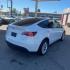 2021 WHITE Tesla Model Y (5YJYGDEEXMF) with an Dual AC Electric Motors engine, Single-Speed Fixed Gear transmission, located at 412 Auto Vista Drive, Palmdale, CA, 93551, (661) 945-0620, 34.592636, -118.136681 - Photo#2