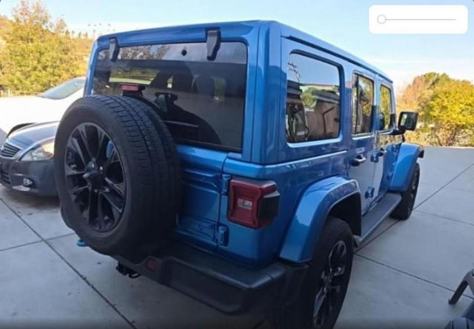 2023 BLUE Jeep Wrangler 4xe (1C4JJXP68PW) with an 4-Cyl Turbo 2.0L Hybrid engine, Automatic 8-Spd transmission, located at 412 Auto Vista Drive, Palmdale, CA, 93551, (661) 945-0620, 34.592636, -118.136681 - Photo#3