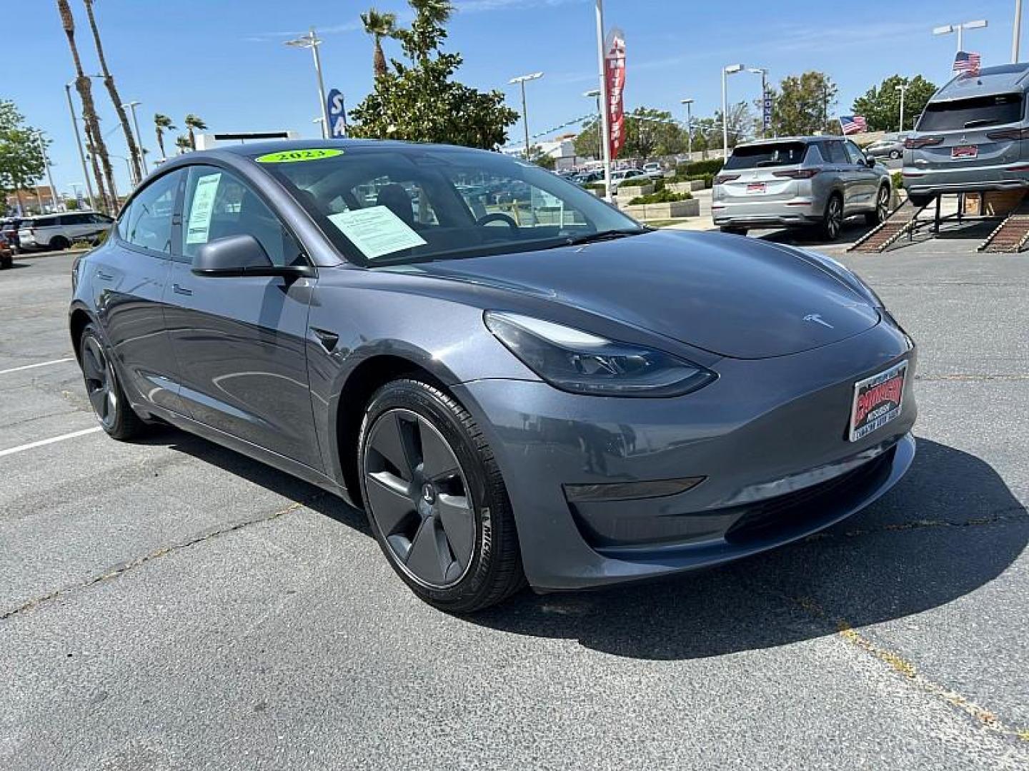 2023 GRAY Tesla Model 3 (5YJ3E1EA2PF) with an AC Electric Motor engine, Single-Speed Fixed Gear transmission, located at 412 Auto Vista Drive, Palmdale, CA, 93551, (661) 945-0620, 34.592636, -118.136681 - Photo#0